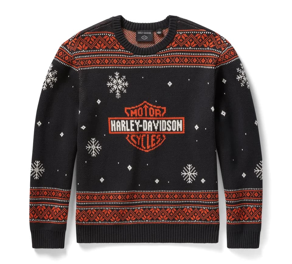 Abbigliamento Harley-Davidson: maglione natalizio in maglia nera con logo arancione, fiocchi di neve bianchi e pattern Fair Isle.