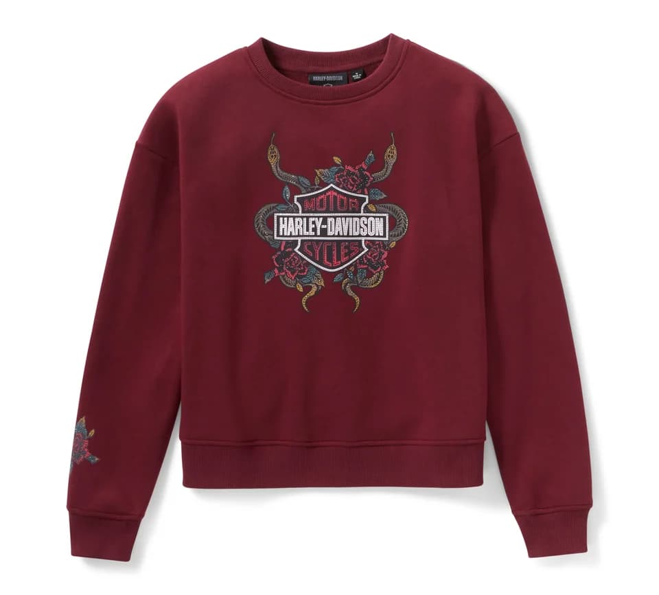 Felpa girocollo Harley-Davidson bordeaux con logo bar & shield, serpenti e rose ricamati sul petto. Dettaglio floreale sulla manica sinistra. Abbigliamento donna.