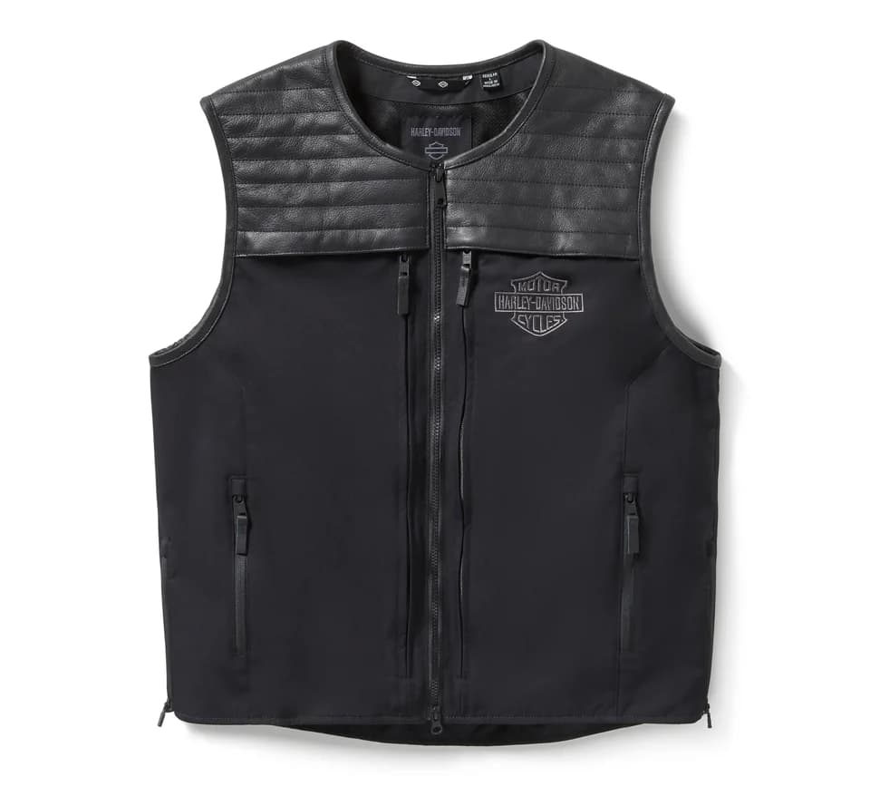 Gilet nero Harley-Davidson con inserti in pelle trapuntata sulle spalle, chiusura a zip frontale e logo Bar & Shield ricamato.