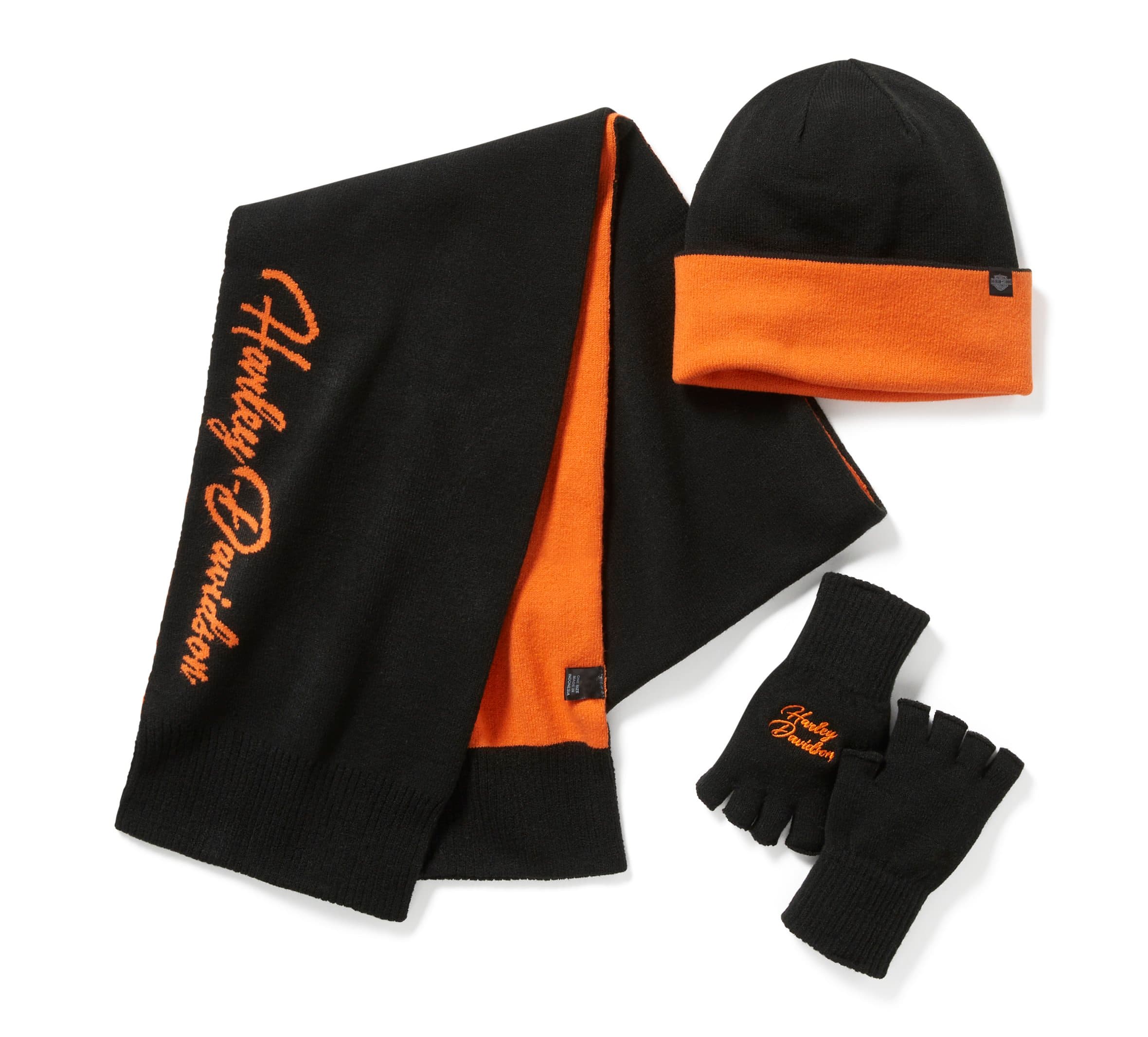 Set abbigliamento invernale Harley-Davidson nero e arancione, composto da sciarpa, berretto e guanti senza dita, con logo ricamato.