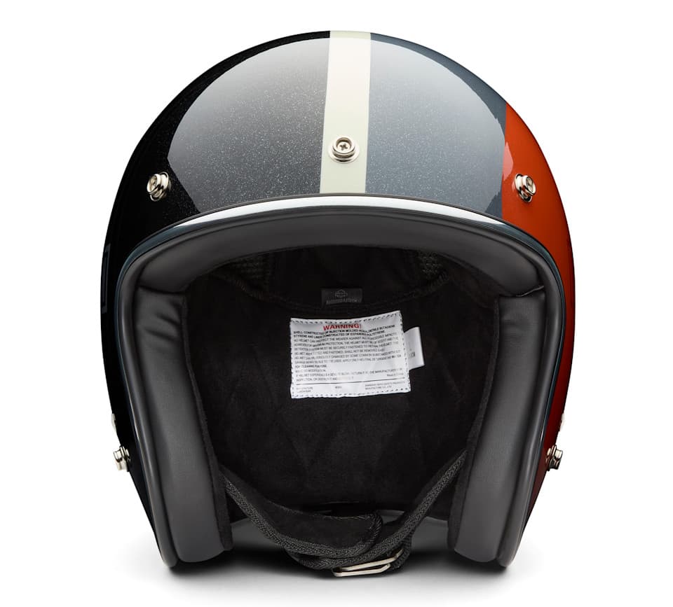 Casco moto Harley-Davidson open-face nero glitterato con striscia crema e sezione arancione, vista interna con imbottitura e etichetta di sicurezza.